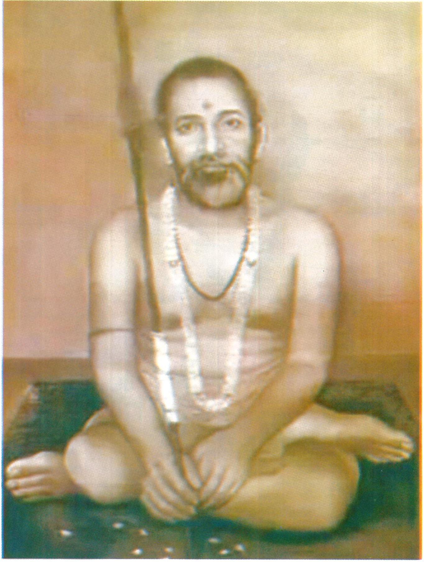 दण्ड के साथ विराजमान धर्मसम्राट स्वामी करपात्री जी महाराज